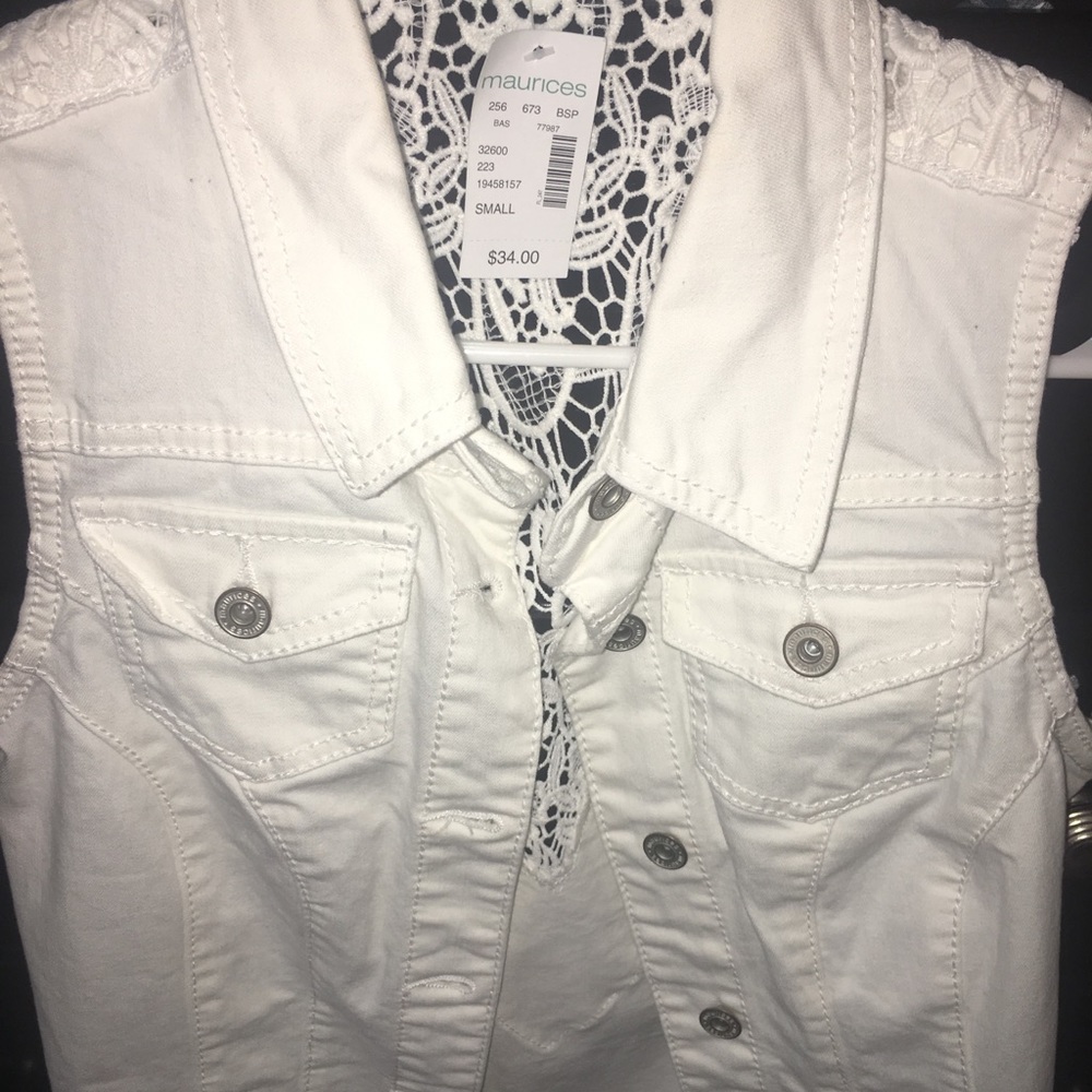 Maurice’s white sleeveless jean jacket